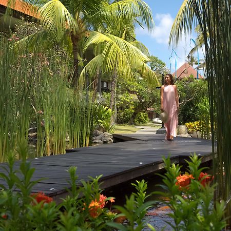 Bali Dynasty Resort Кута Экстерьер фото The resort's gardens