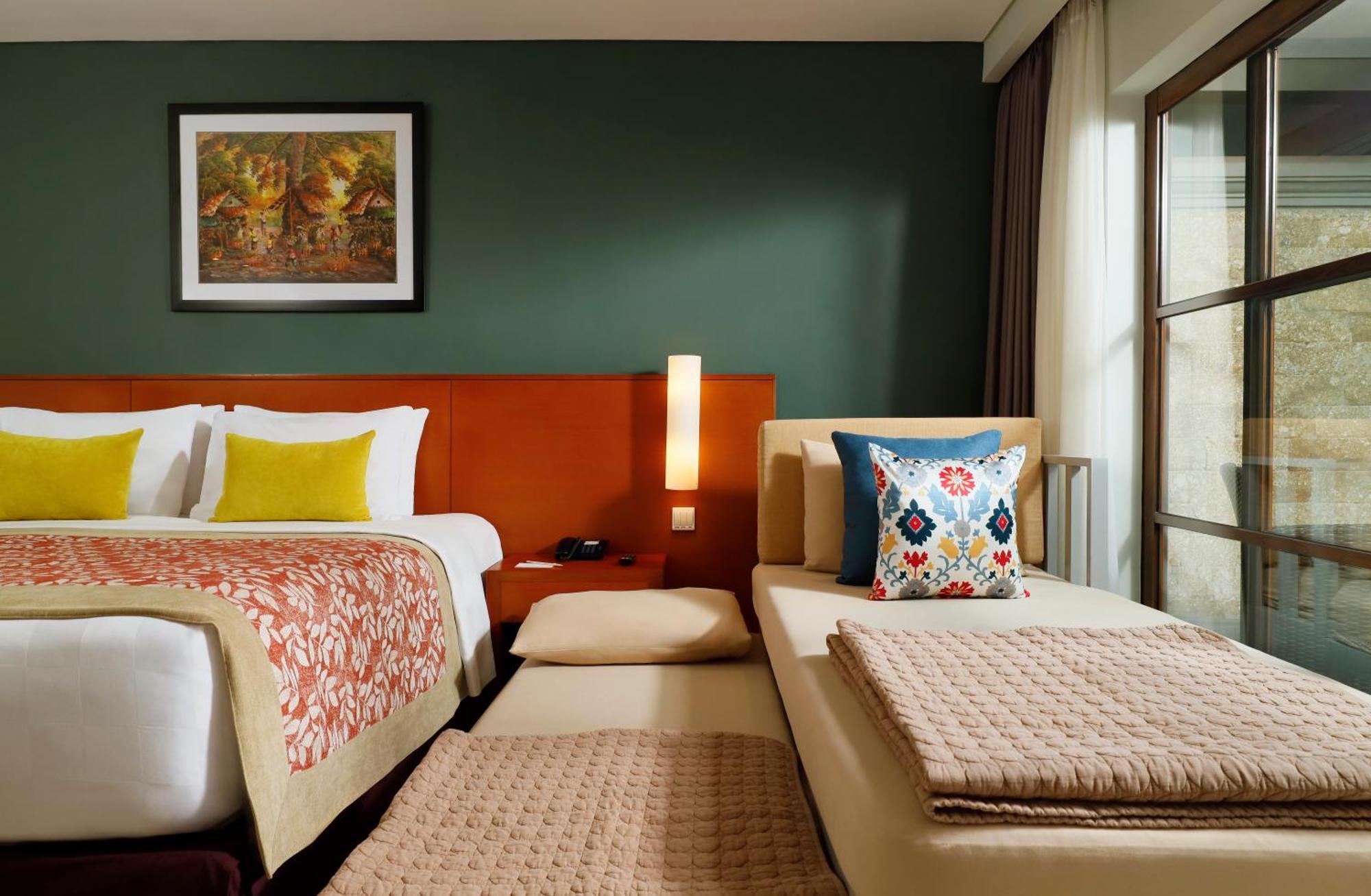 Bali Dynasty Resort Кута Экстерьер фото A room at the hotel